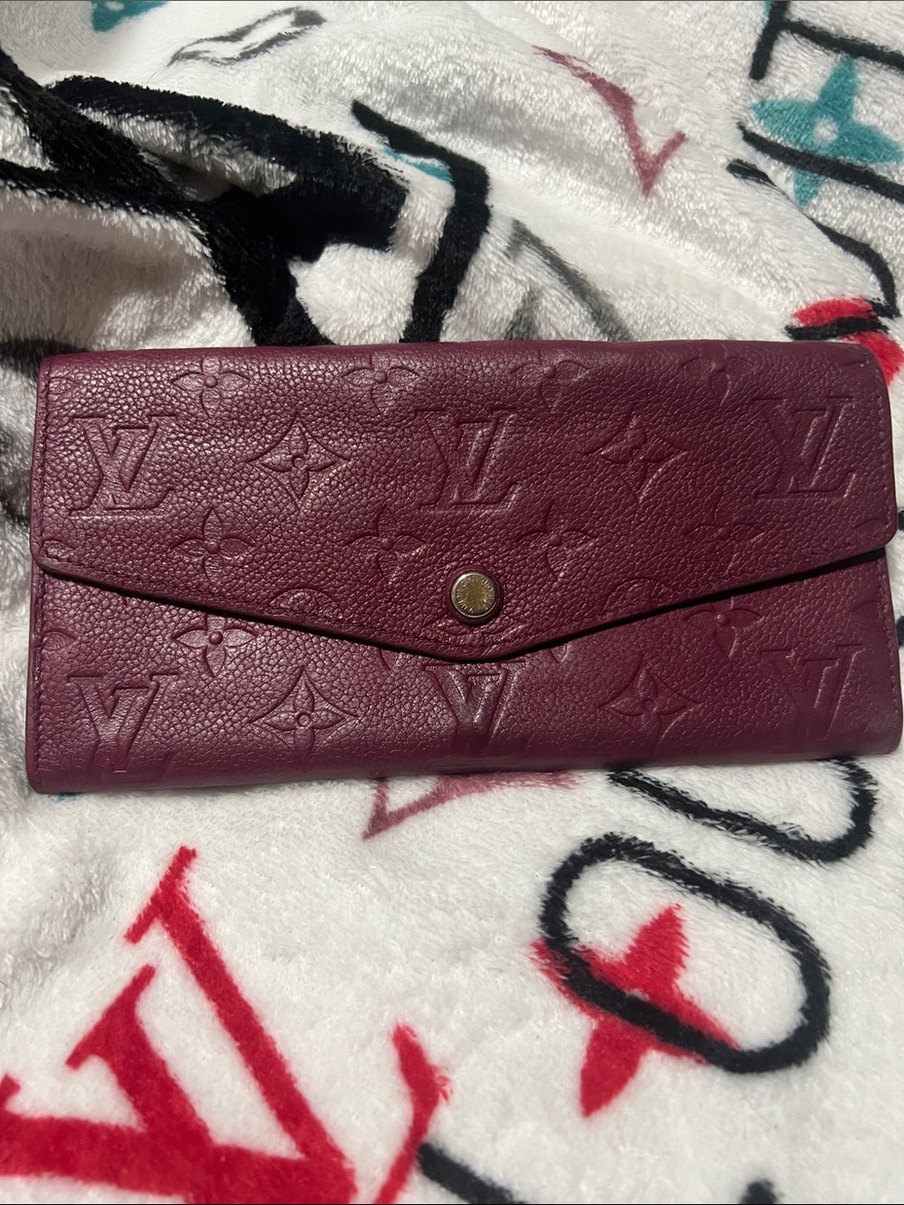 Louis Vuitton Plum Embossed Monogram Snap Continental Wallet Empriente.
